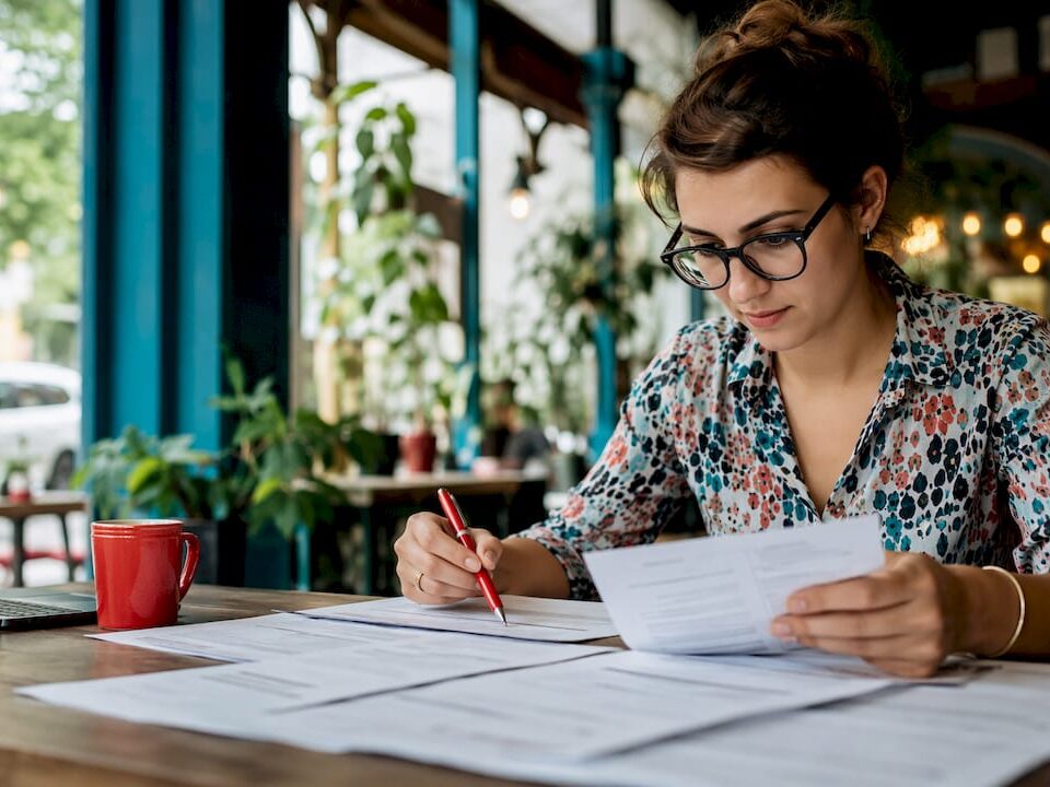 QA manager reviewing language quality assurance documents